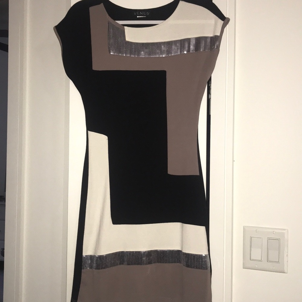 Simple dress with a little sequins for fun.